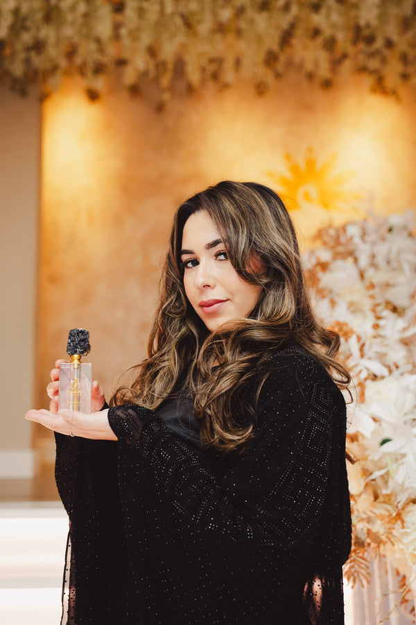 A guest with her Nuble Oud attar